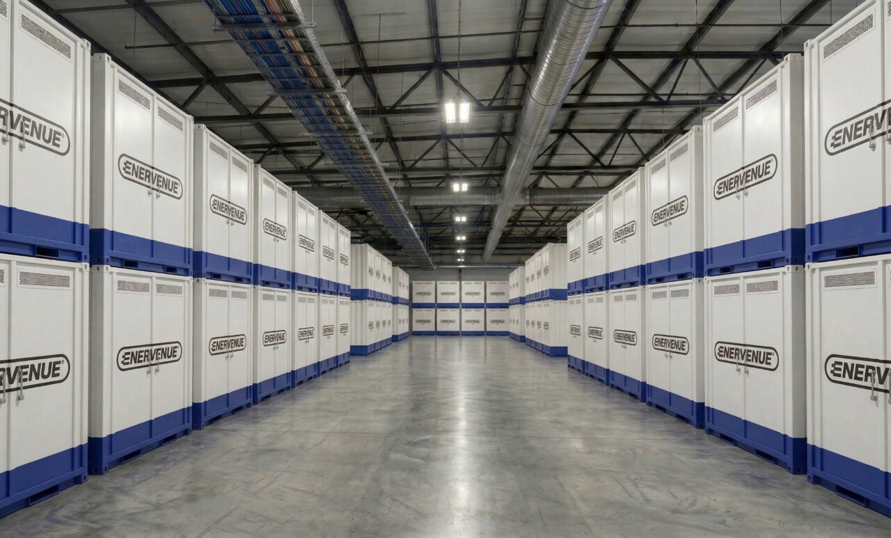 A row of industrial nickel-hydrogen battery vessels in a clean energy storage facility.