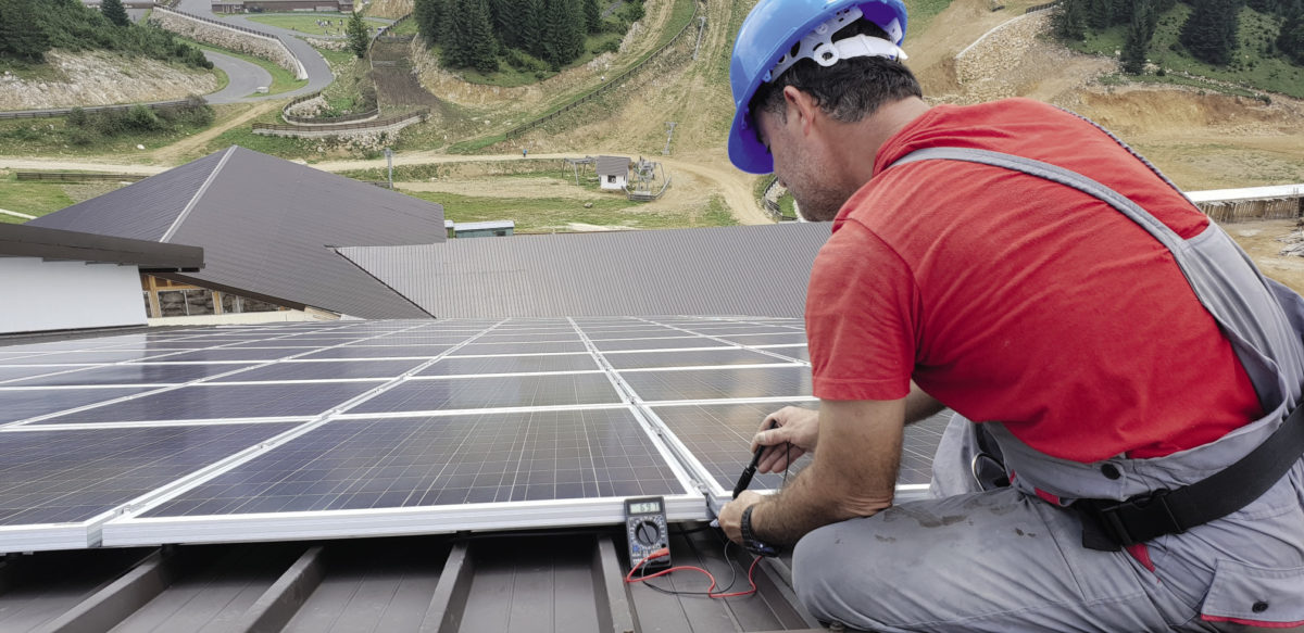 Aerial view of municipal rooftops in Spain suitable for solar panel installation.