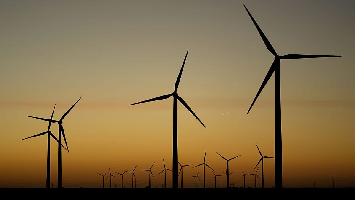 A digital illustration of a solar panel integrated into a clock face representing the climate.