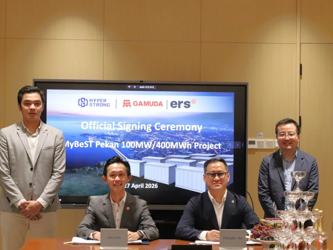 Large scale battery energy storage system containers in a utility-scale field with Chinese branding