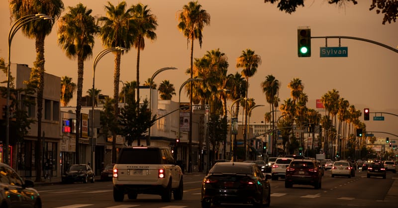 A modern heat pump unit installed outside a European residential home during winter