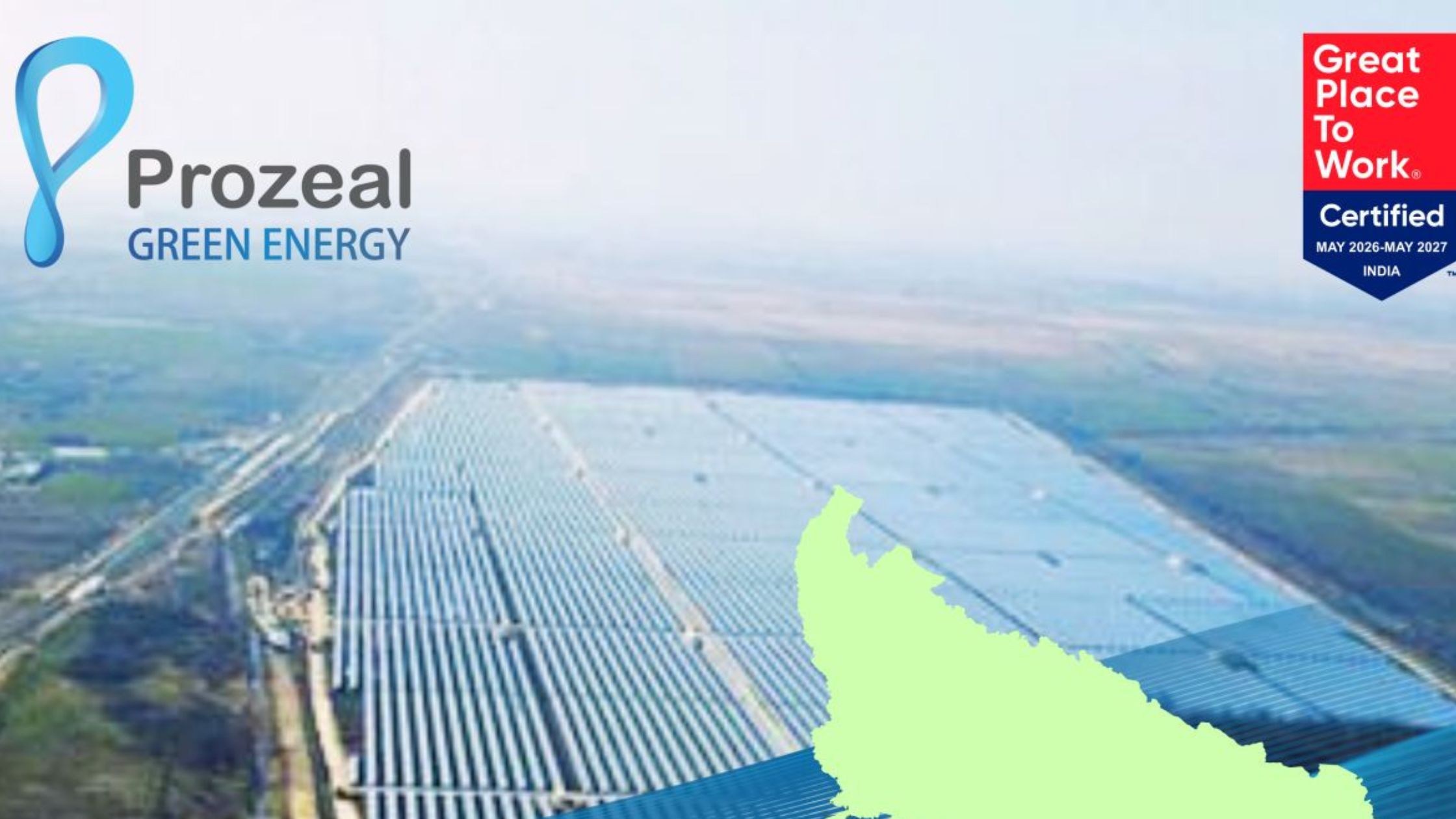 Large scale solar farm installation in an industrial landscape with steel manufacturing facility in background