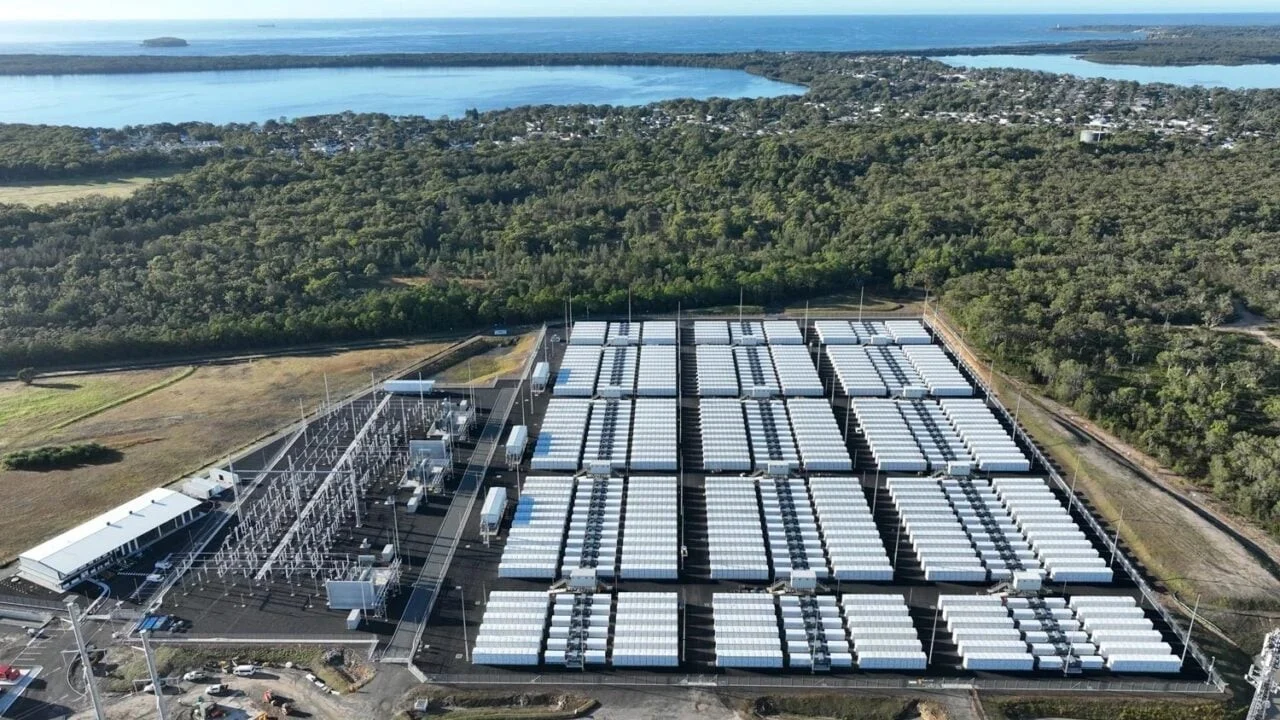 Large scale battery energy storage system facility with high voltage transformers and substation equipment