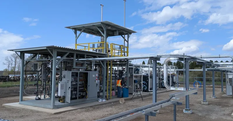 A decentralized green ammonia production facility integrated with renewable energy infrastructure in a rural setting.