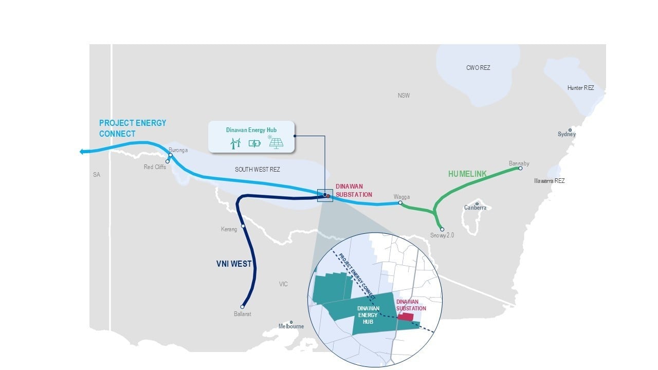 Aerial view of a large-scale solar farm integrated with utility-scale battery storage containers.