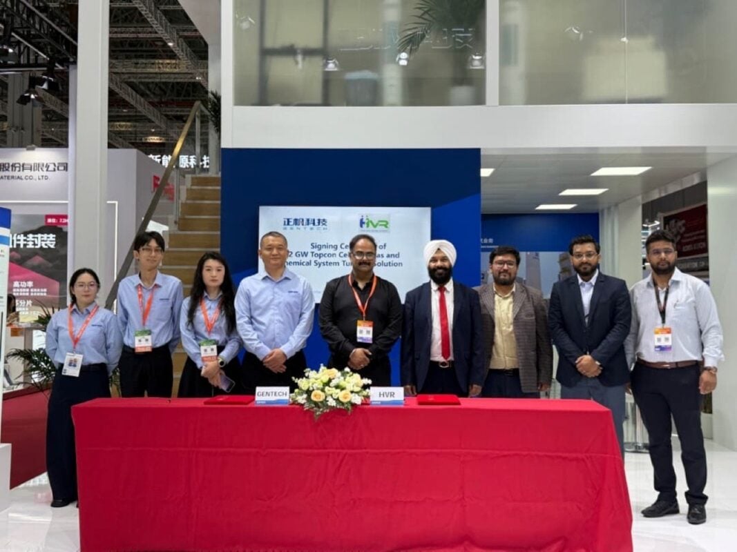 Automated solar cell production line with robotic arms handling silicon wafers