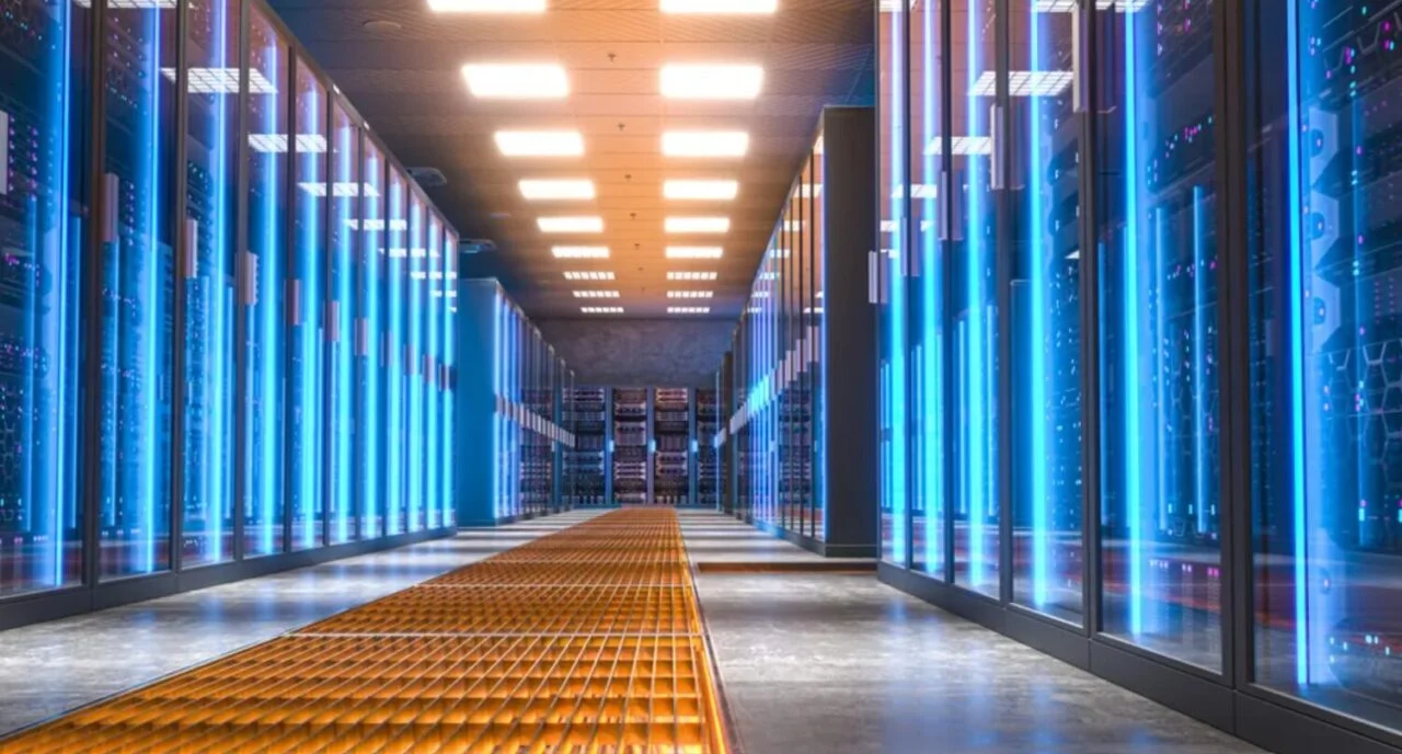 A modern industrial data center facility integrated with large-scale battery storage units and Siemens electrical infrastructure.