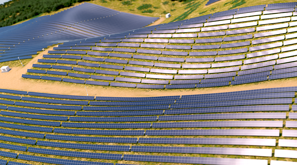 A row of 1P solar trackers being installed on a sunny, flat field with workers in the distance.