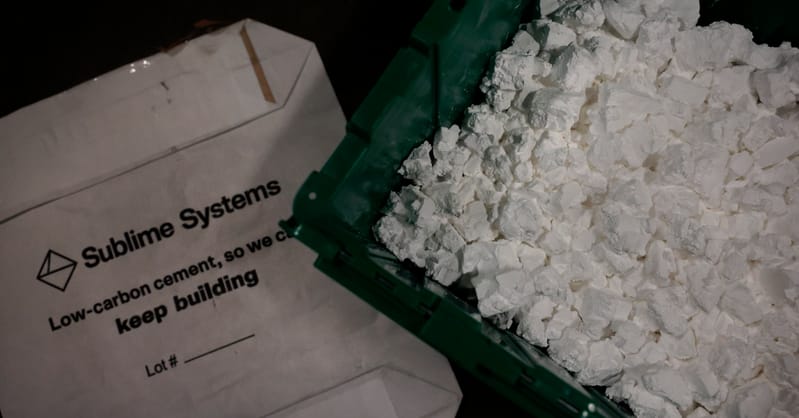 A construction site for a renewable energy project showing halted progress and empty equipment.