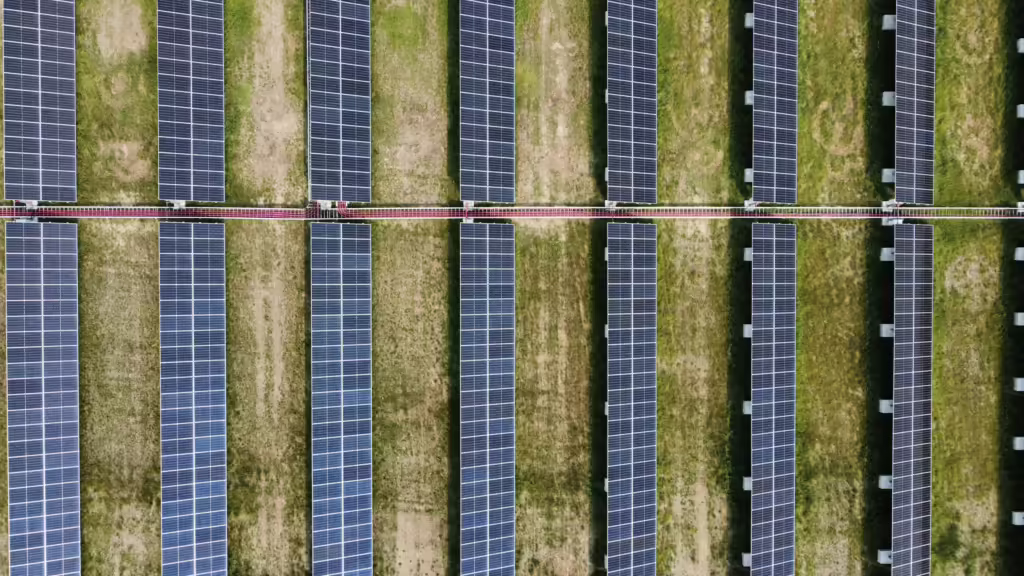 Aerial view of a large-scale solar farm in the Spanish countryside