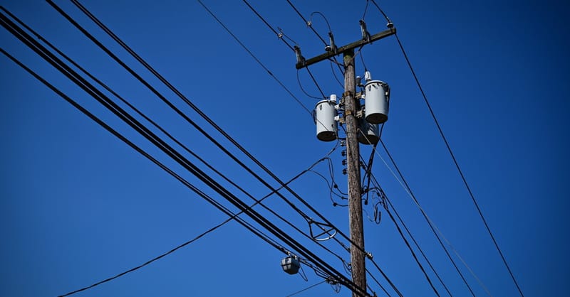 A residential rooftop solar installation with a home battery system in a European city.