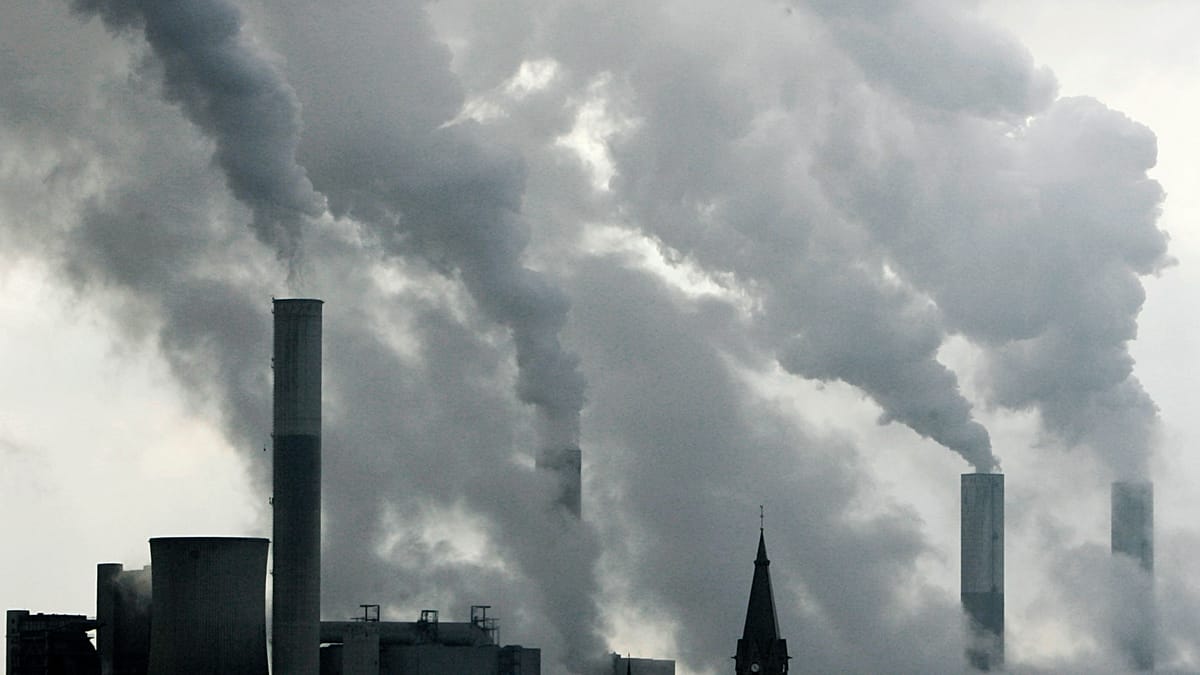 A view of the smoke stacks at a coal-fired power plant in Italy