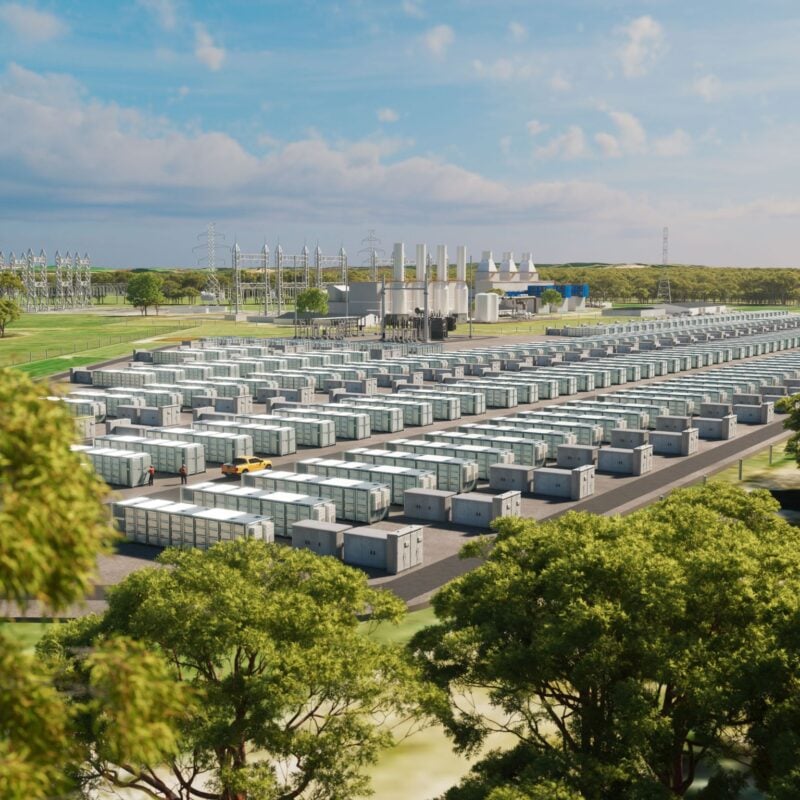 Large scale industrial battery energy storage system containers installed next to solar panel arrays