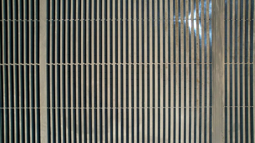 Aerial view of a solar installation on a municipal rooftop in Spain.
