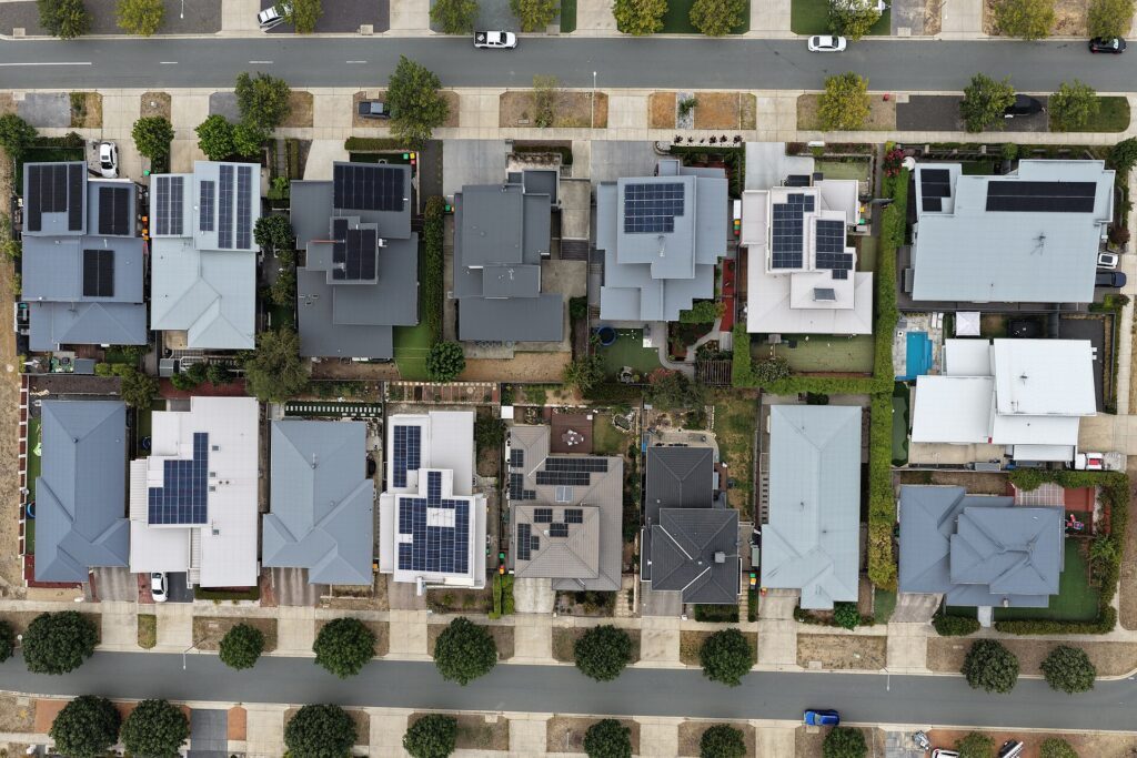 A residential smart energy dashboard showing electricity consumption peaks on a modern tablet.