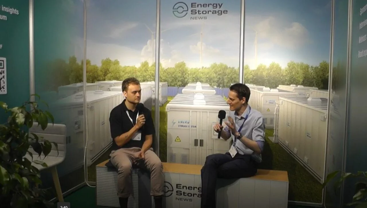 A high-security Fluence Gridstack battery energy storage system at a modern industrial facility.