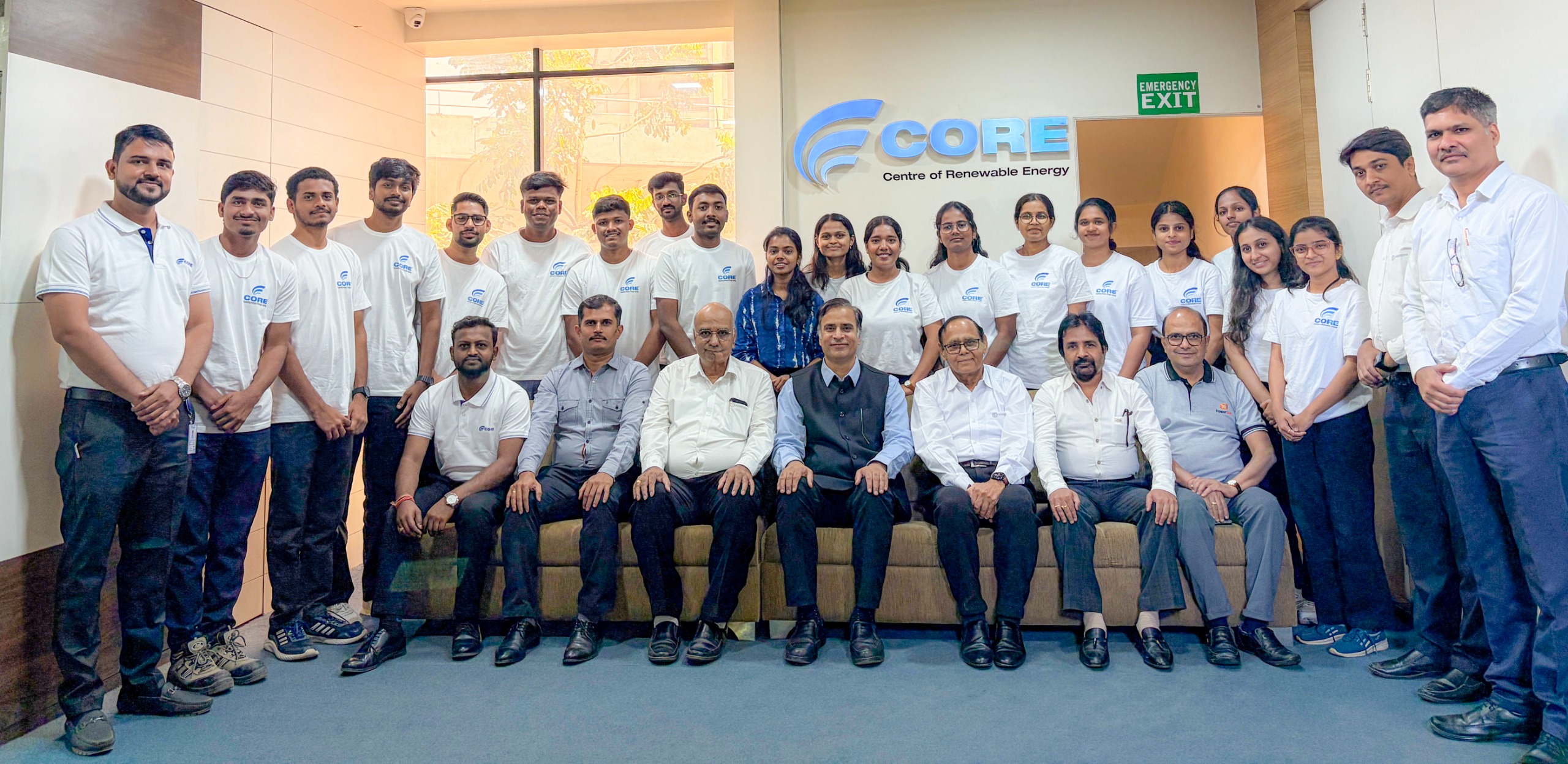 Tata Power and CORE Academy executives standing together during a renewable energy workforce training partnership announcement.