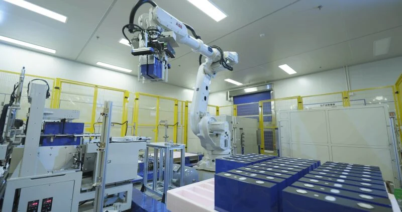 Large-format 587Ah LFP battery cells stacked in a high-capacity industrial BESS rack configuration.