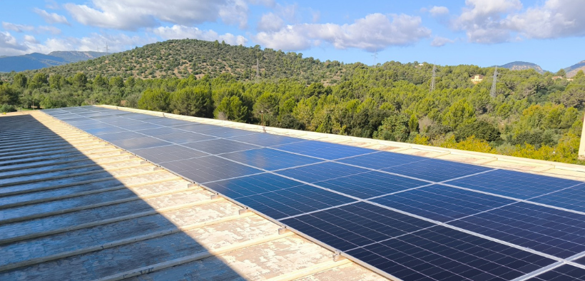Solar carports with integrated EV charging stations at a university campus in Spain.