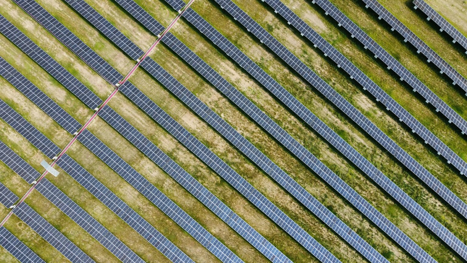 Aerial view of a floating solar PV array on a water reservoir