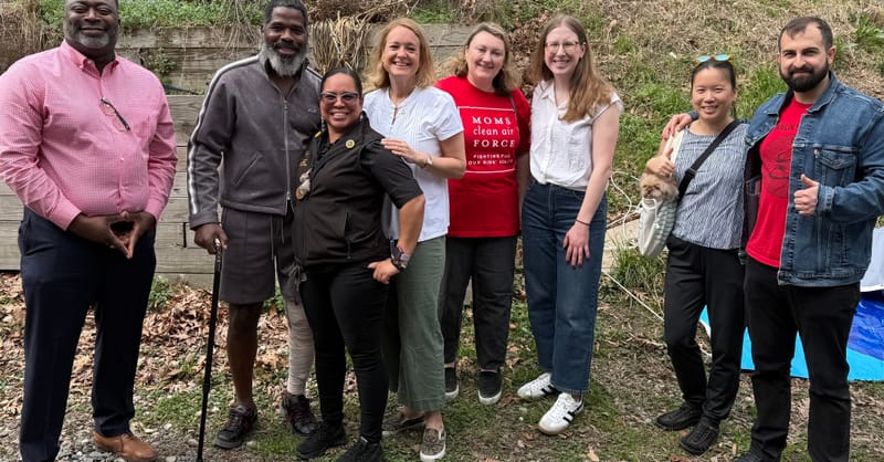 An abstract diagram showing underground geothermal pipes alongside traditional solar panel installations on a rooftop.