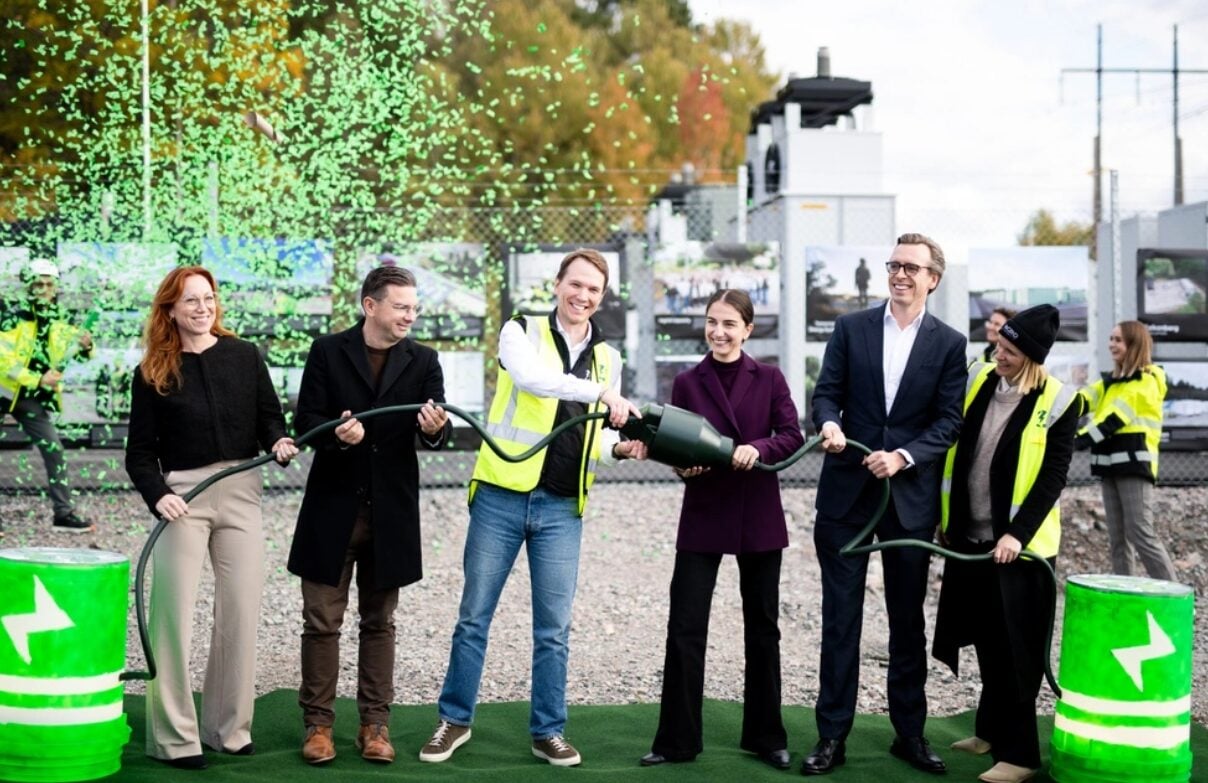Large scale lithium-ion battery containers at a Swedish substation site.