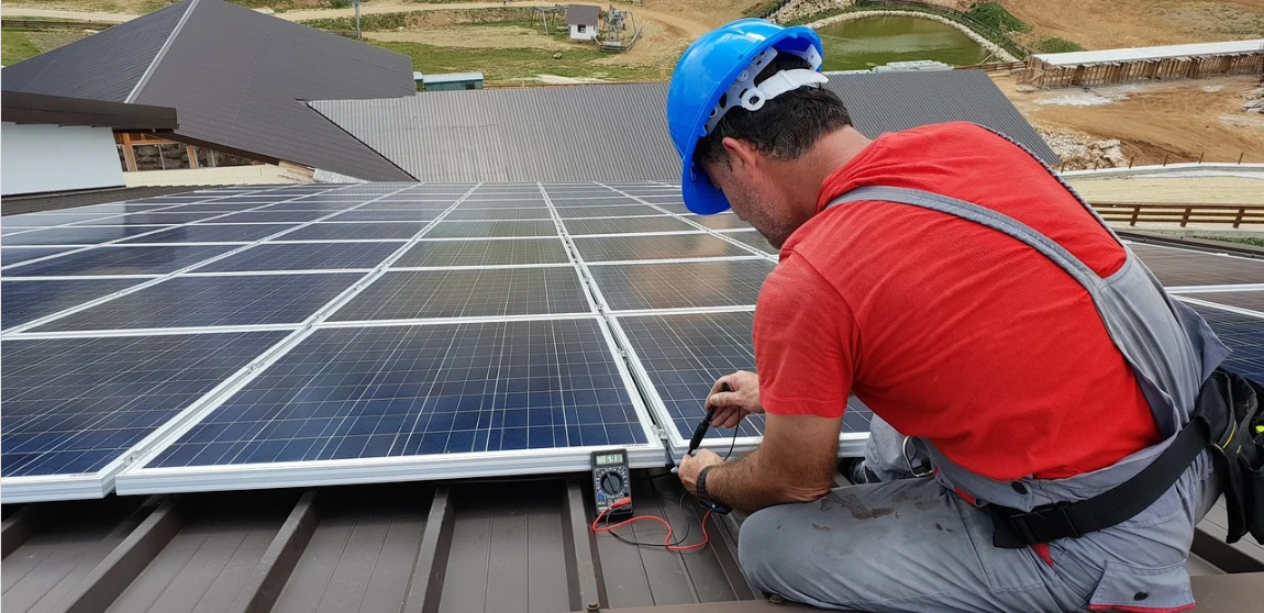 Aerial view of a modern hospital rooftop prepared for solar panel installation