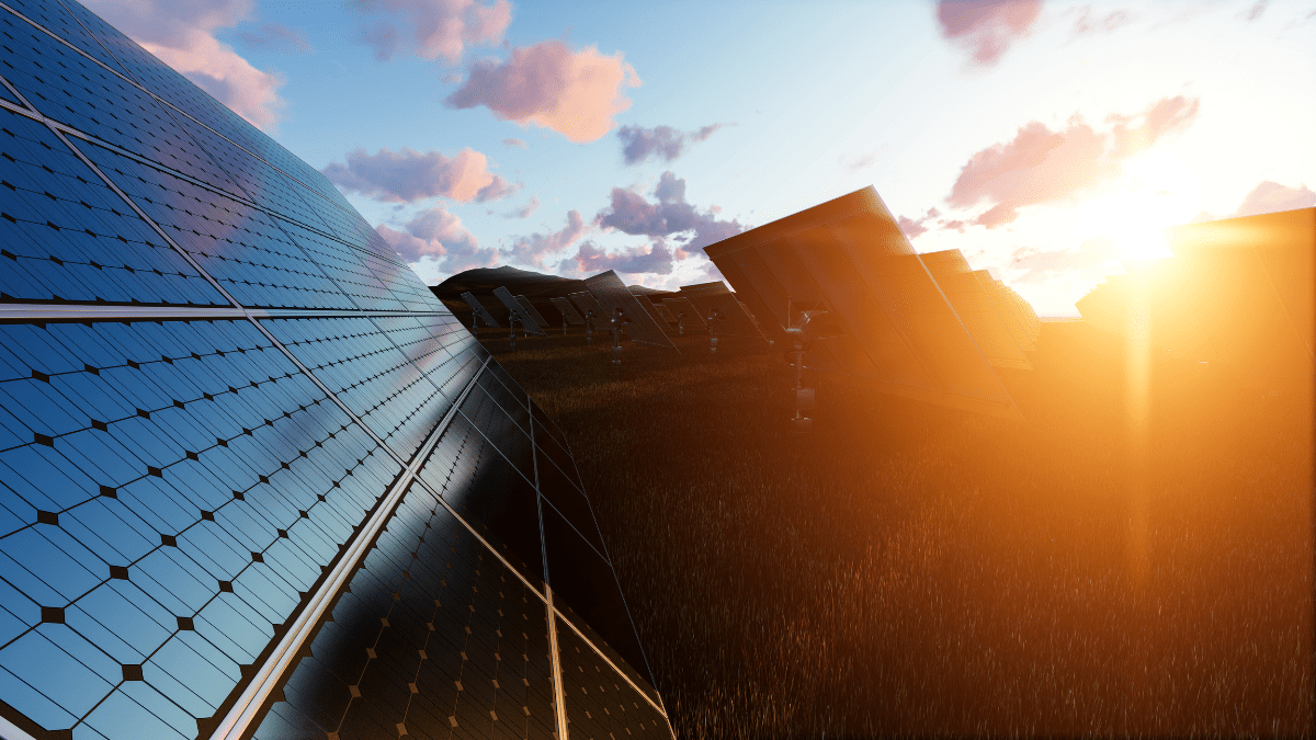 Power lines against a stormy sky, representing grid vulnerability and the need for solar resilience.