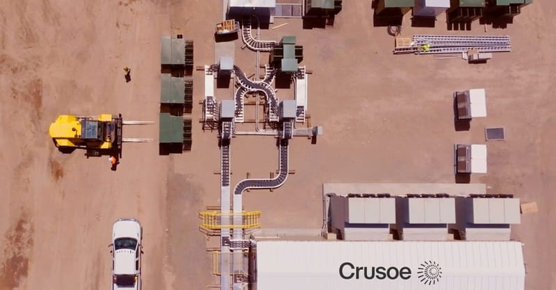 A grid-scale iron-air battery facility showing large-scale energy storage infrastructure in a field.
