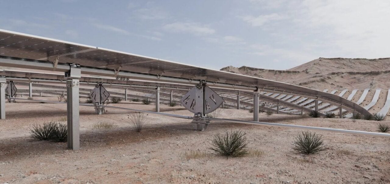 Array Technologies OmniTrack solar tracker installation on undulating terrain