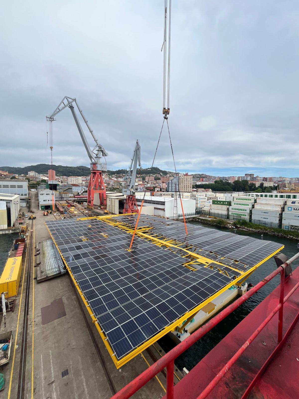 Large floating solar platform being towed into the Atlantic waters near Vigo, Spain.