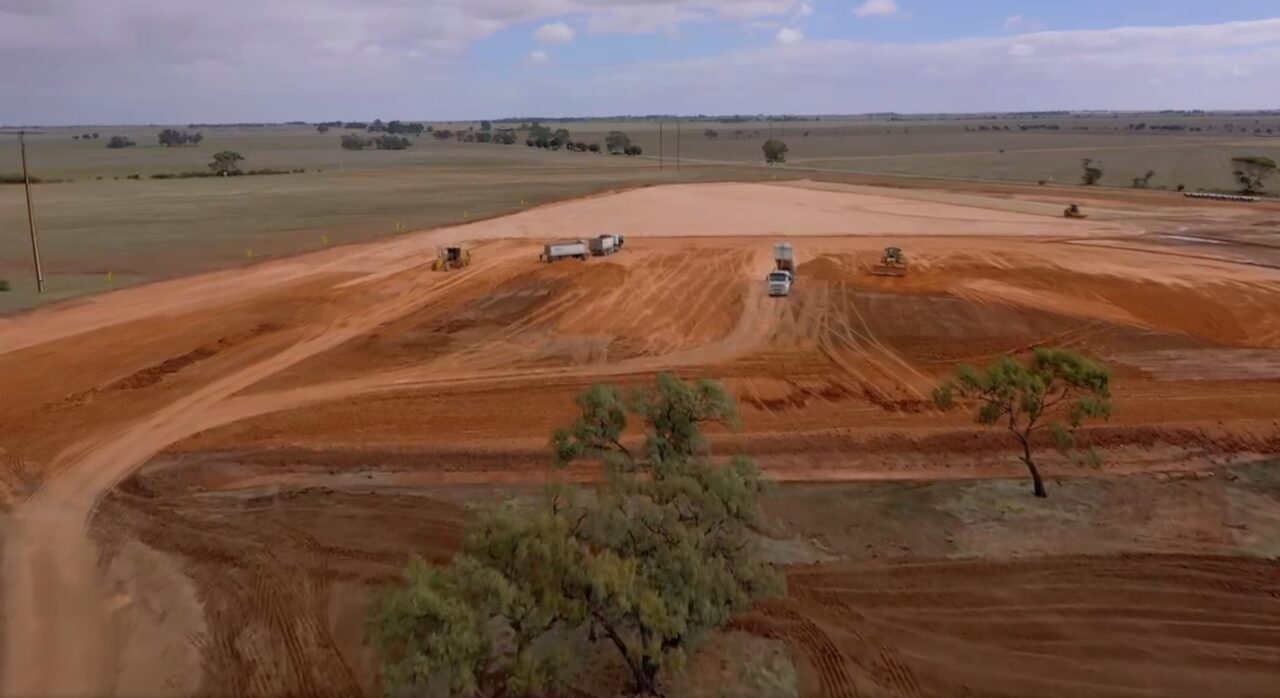 Aerial view of a large-scale industrial battery energy storage system under construction