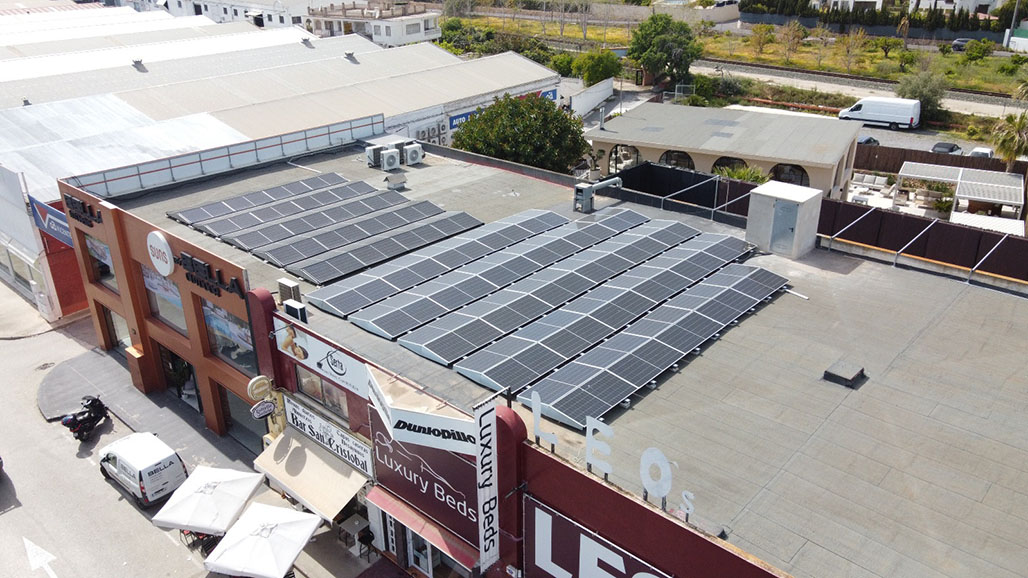 A 100kW solar PV array installed on a public cemetery roof in Altea, Spain.
