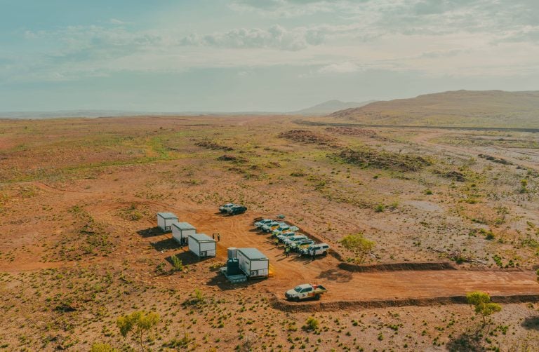 Aerial view of a massive iron ore mine in the Australian outback with solar potential