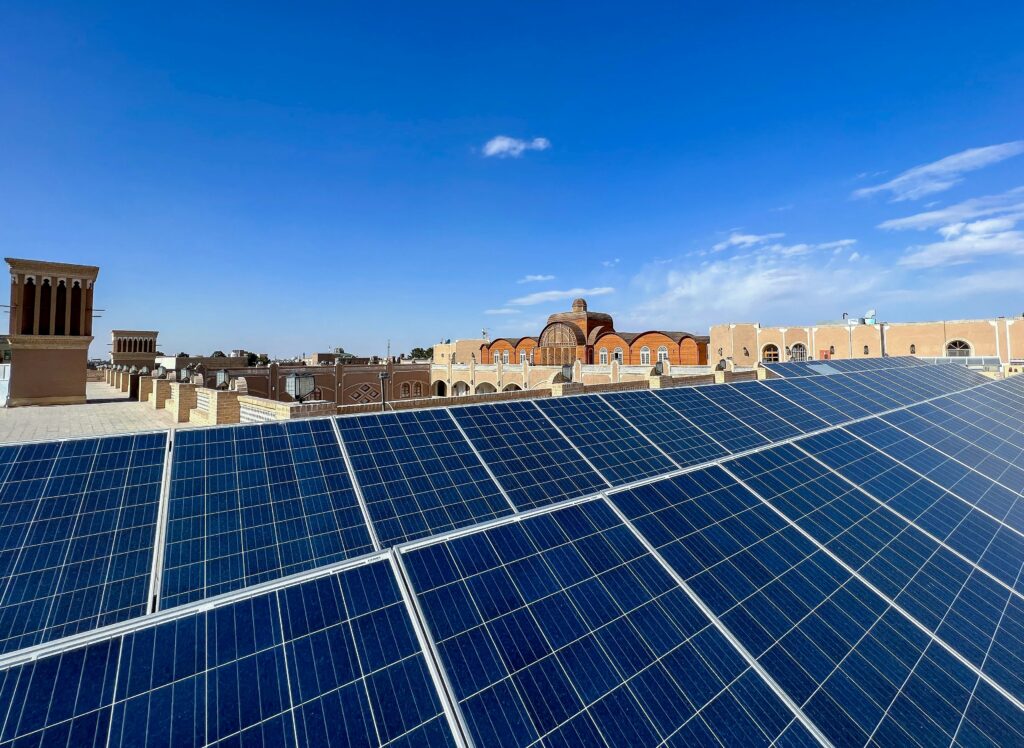 Aerial view of a cultural center rooftop in a Spanish municipality with solar panel layout markings