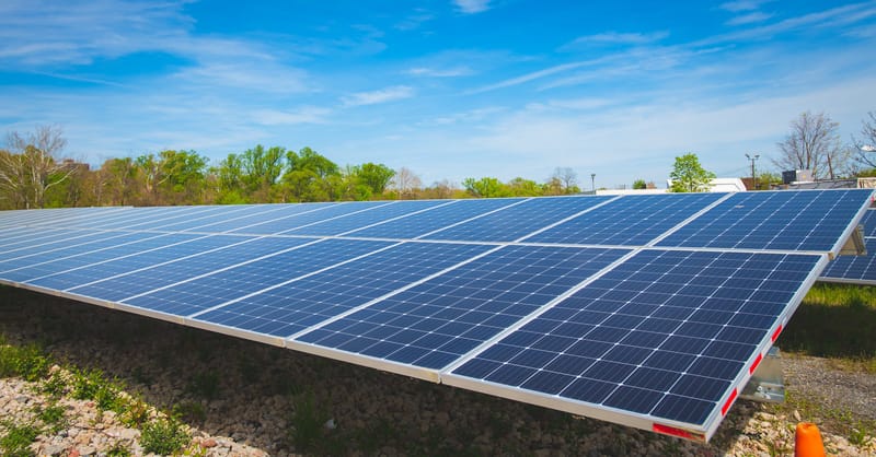 A digital heat map showing electrical grid capacity and solar project locations across a rural landscape.