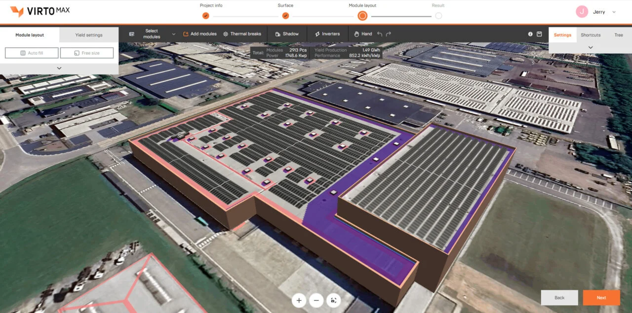 A digital 3D model of a commercial solar carport project being designed on a tablet