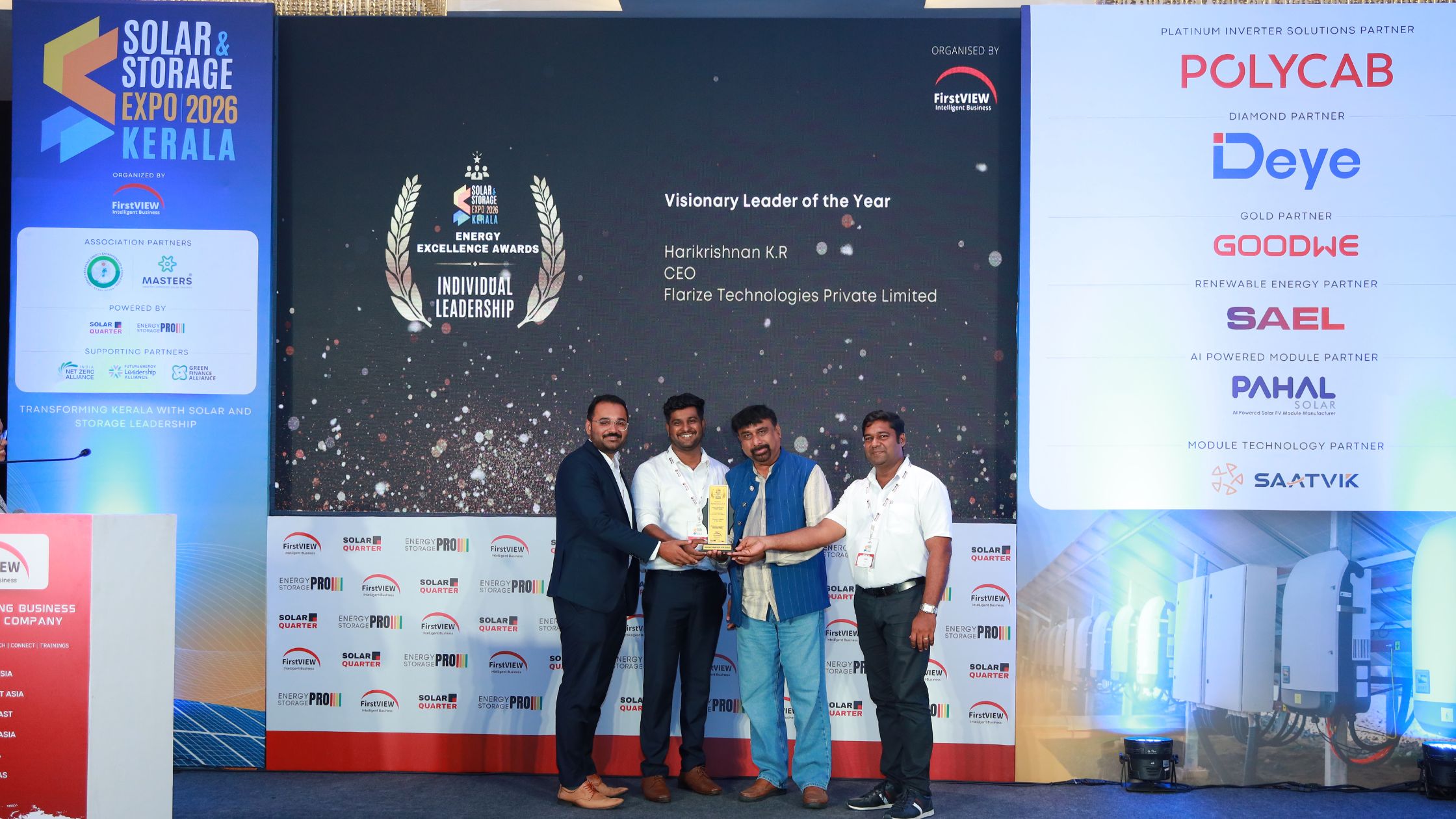 A visionary leader receiving an award for innovations in solar energy platform technology.