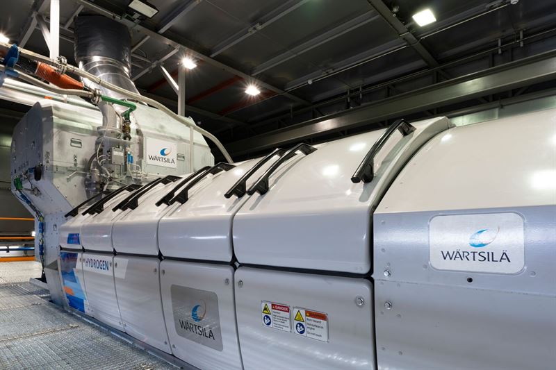A large-scale industrial engine in a power plant setting, representing Wärtsilä's new hydrogen technology.